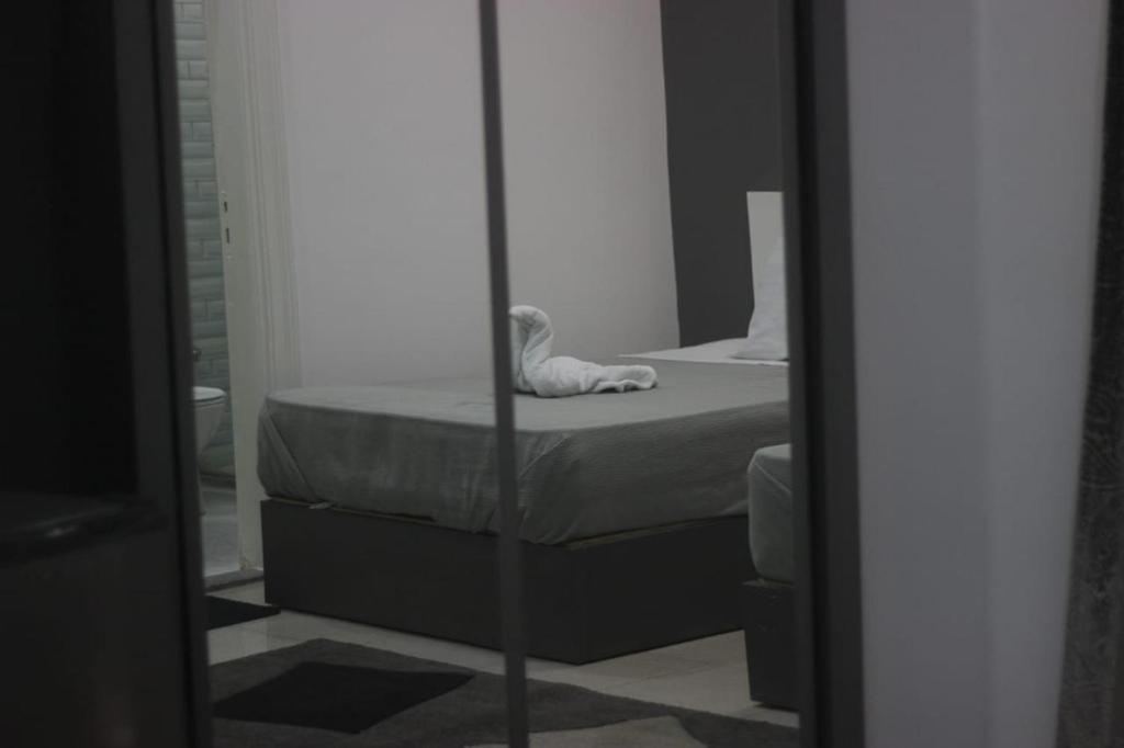 Postel nebo postele na pokoji v ubytování Azar Boutique Hotel