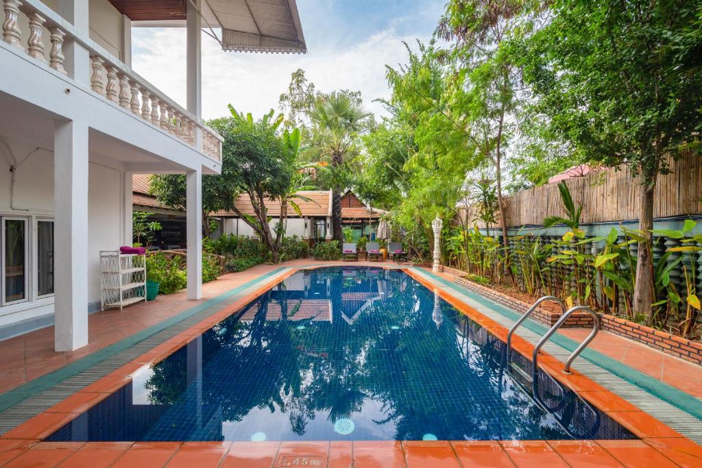 an image of a swimming pool in a house at Lavender Angkor Boutique in Siem Reap