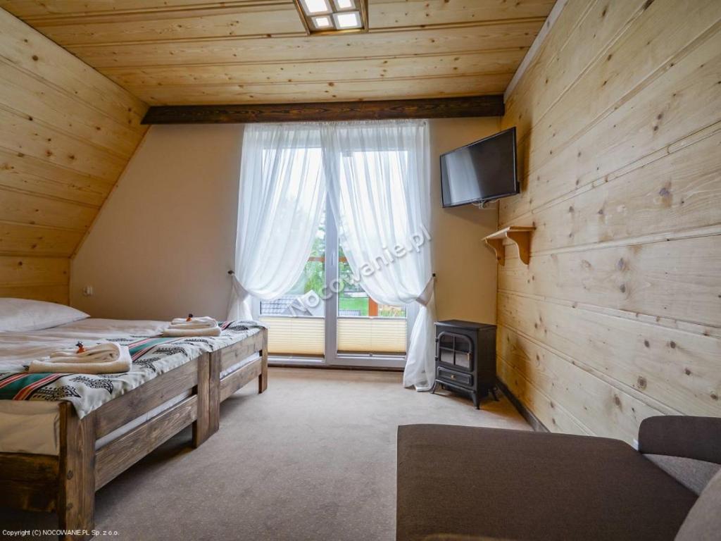 Telewizja i/lub zestaw kina domowego w obiekcie Kazikowa Kuźnia
