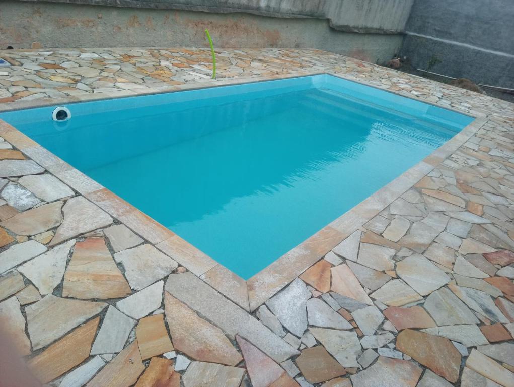 Πισίνα στο ή κοντά στο Maravilhosa vila a 150 m da praia do GUARAÚ, para 30 pessoas!
