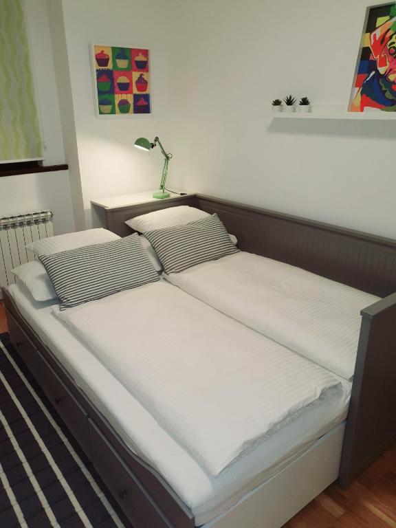 Posteľ alebo postele v izbe v ubytovaní Lucky 13 apartment
