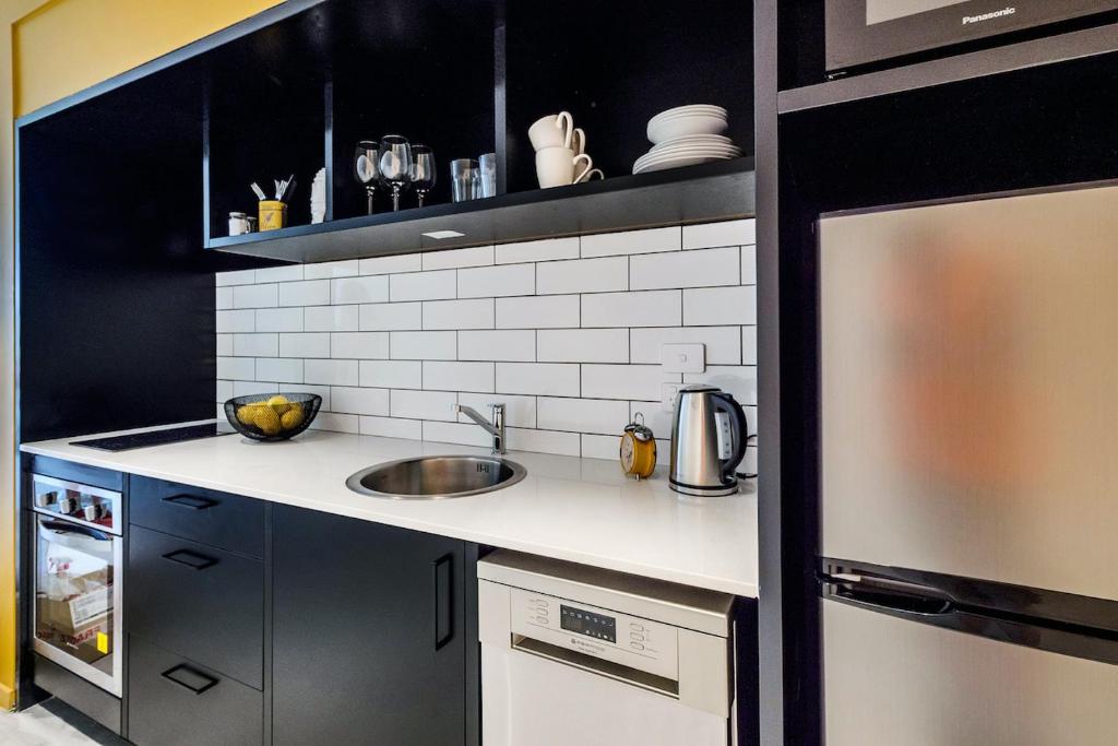 Roomie Apartment Hotel廚房或簡易廚房