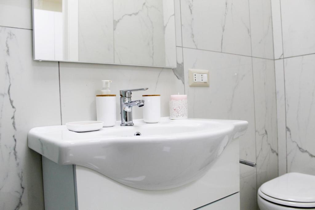 Kúpeľňa v ubytovaní Conforti Apartment