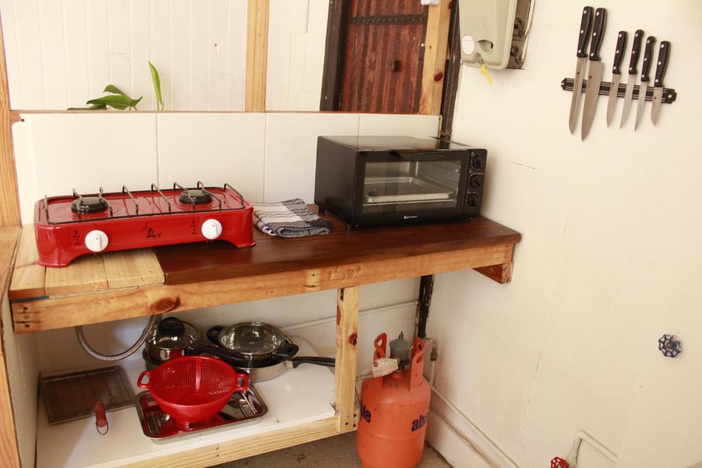 Kuchyň nebo kuchyňský kout v ubytování Casa Volante Hostal