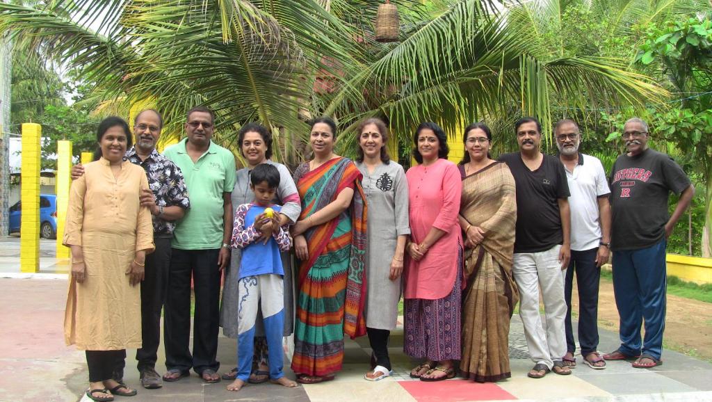a group of people posing for a picture at Holiyday in VGF Farm House in Dānishpet