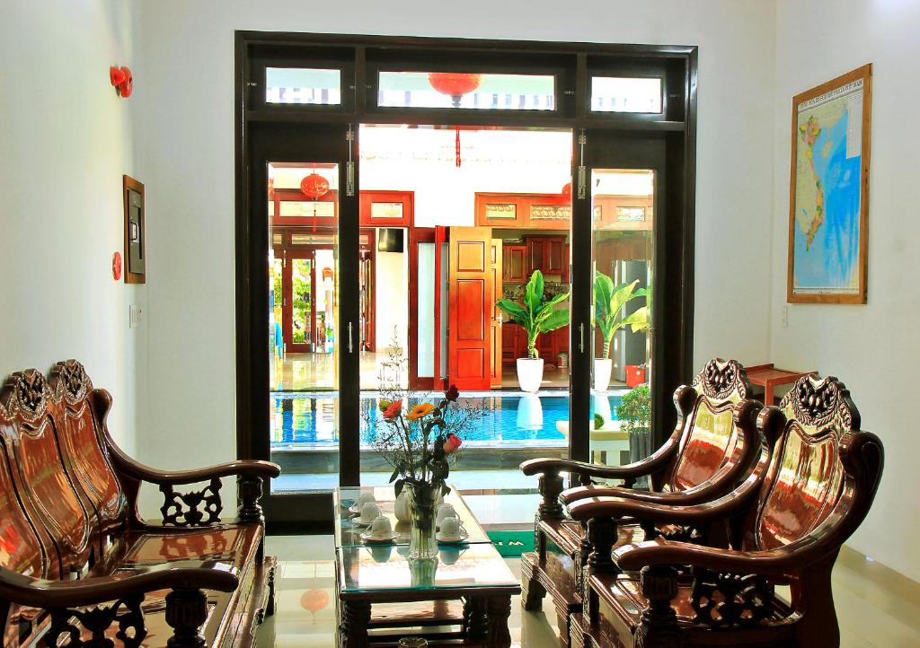Posezení v ubytování Green Island Villa Hoi An
