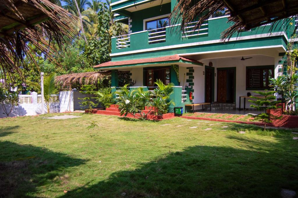 Zahrada ubytování GREEN NEST HOSTEL, Baga- North Goa