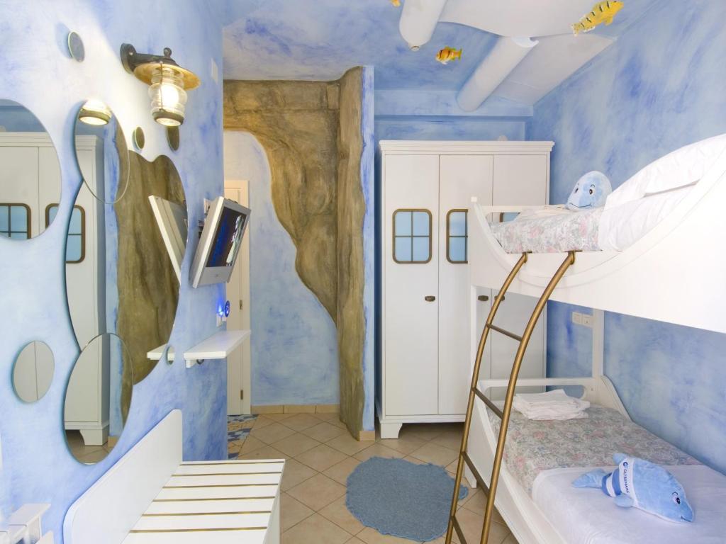 Postel nebo postele na pokoji v ubytování Hotel La Cappuccina