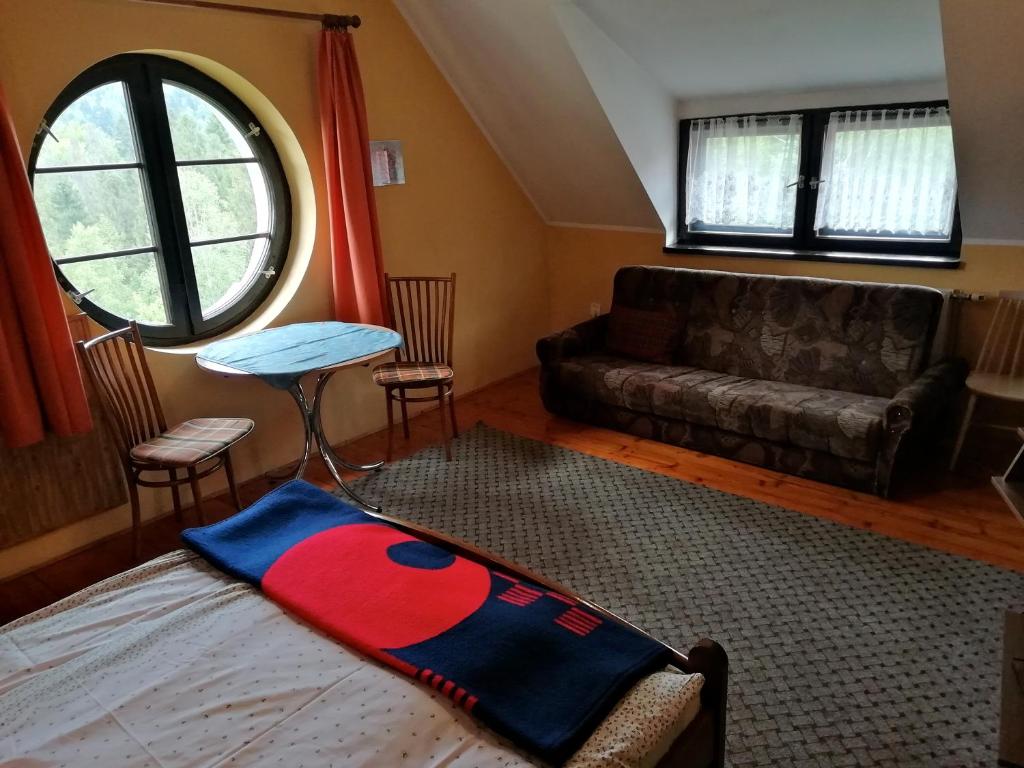 Postel nebo postele na pokoji v ubytování Dworek Sylwia