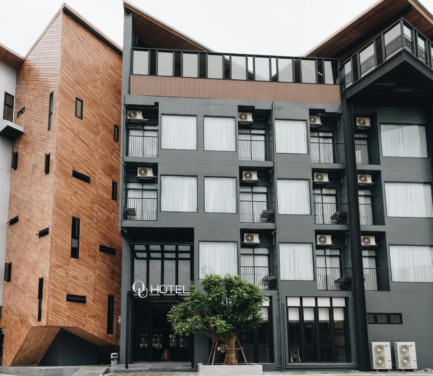 a rendering of the exterior of an apartment building at OU HOTEL in Phitsanulok