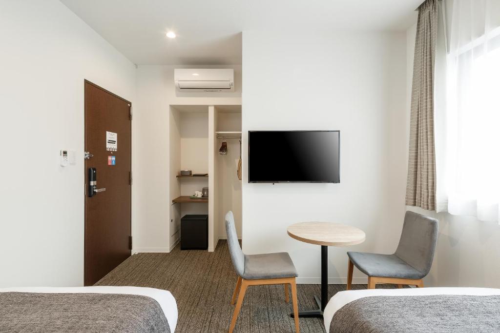 TV a/nebo společenská místnost v ubytování M's Hotel Sanjo Wakoku