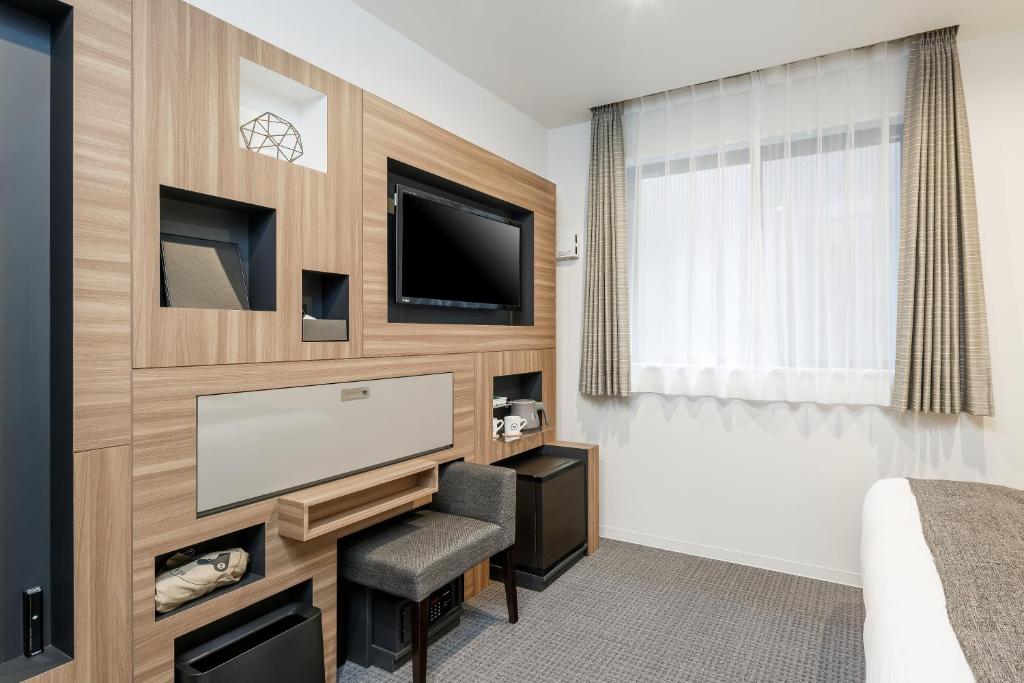 TV a/nebo společenská místnost v ubytování M's Hotel Sanjo Wakoku