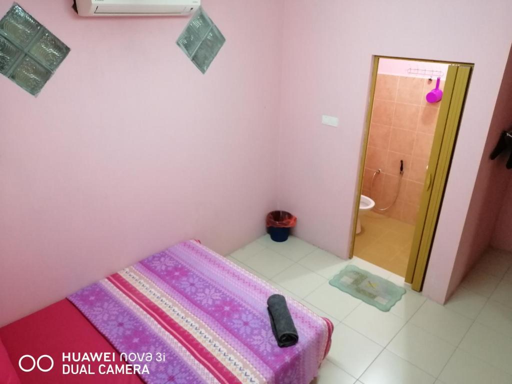 Postel nebo postele na pokoji v ubytování LAYLA INN