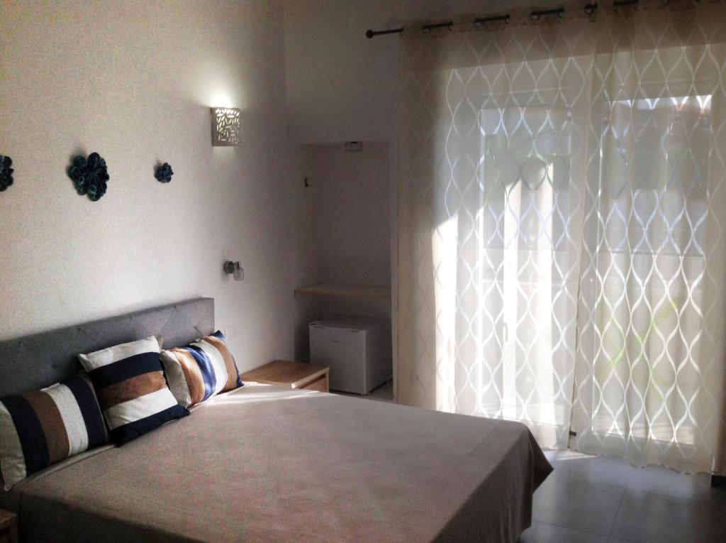 Postel nebo postele na pokoji v ubytování Vistamare