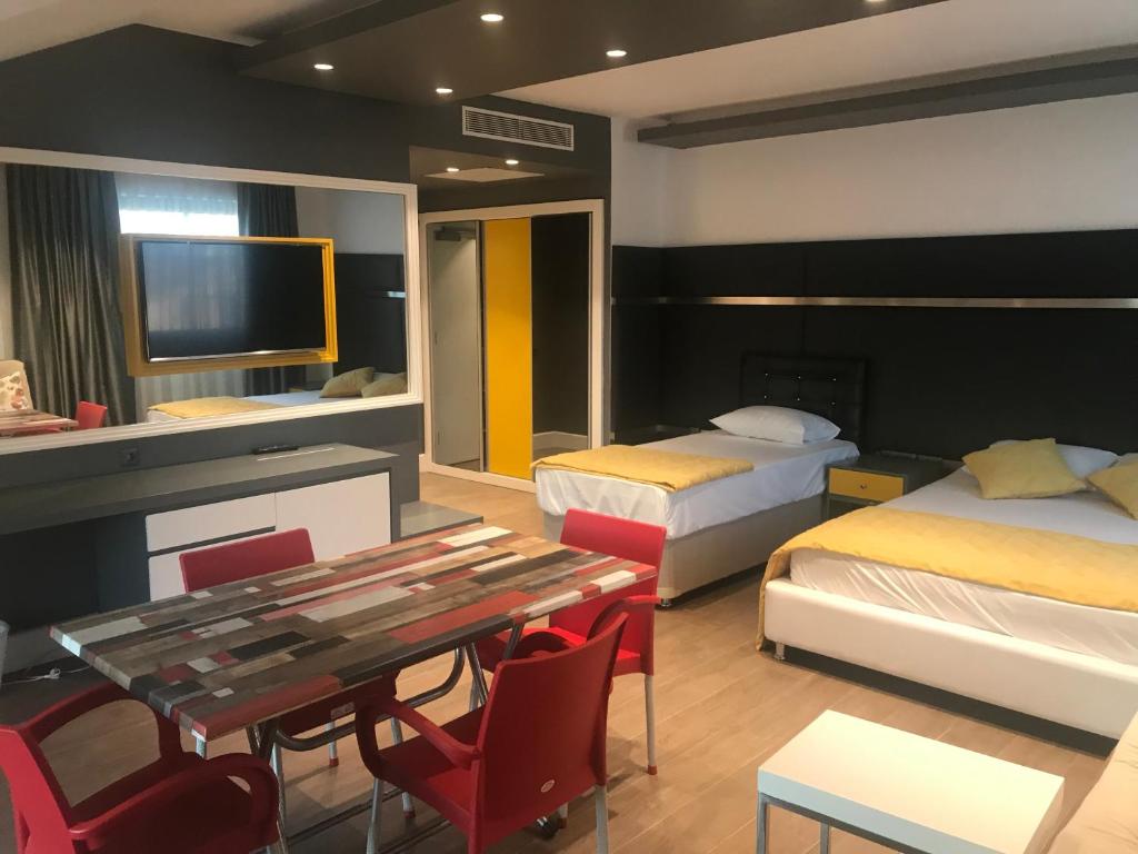 Postel nebo postele na pokoji v ubytování Oyster Boutique Hotel