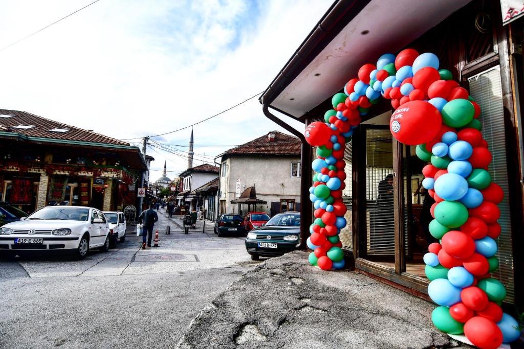 a bunch of balloons on the side of a building at Carpe Diem Apartments in Sarajevo