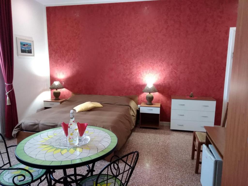 Posteľ alebo postele v izbe v ubytovaní B&B Vico Vacanze