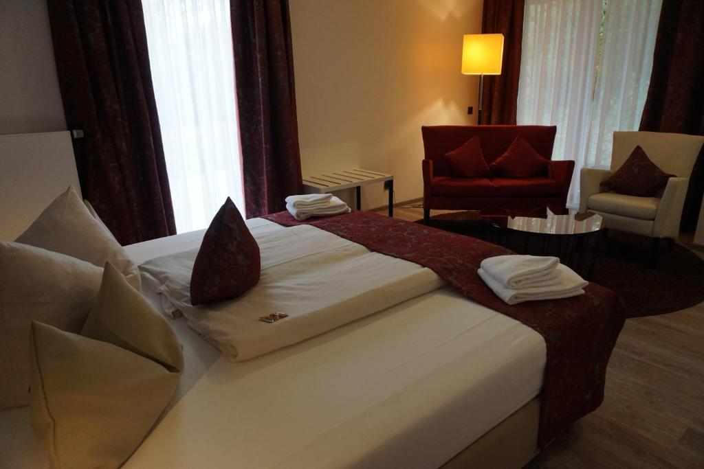 Postel nebo postele na pokoji v ubytování Art Hotel Superior