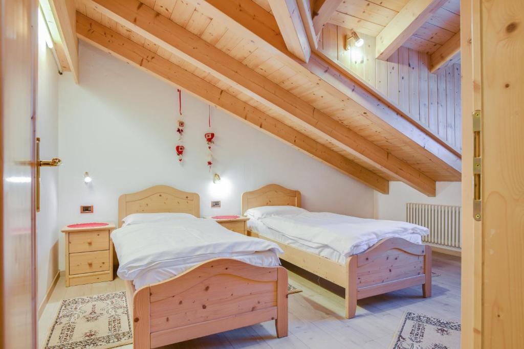 Postel nebo postele na pokoji v ubytování Appartamento Maura