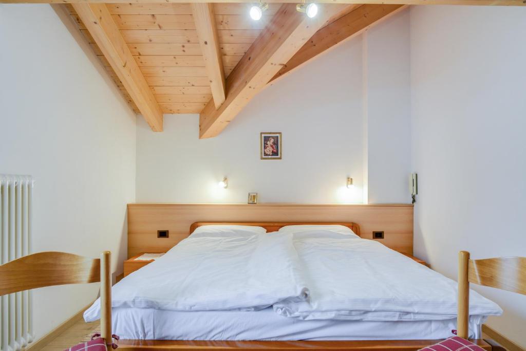 Postel nebo postele na pokoji v ubytování Appartamento Maura