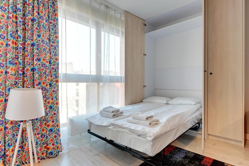 Posteľ alebo postele v izbe v ubytovaní Aura Apartments Old Town