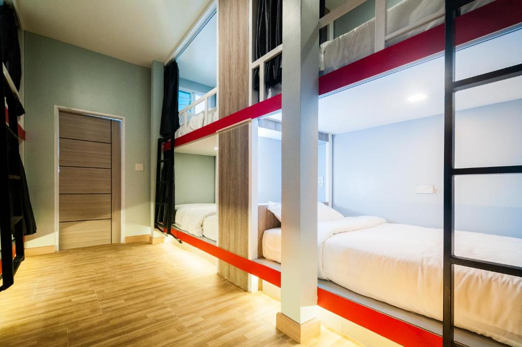 Postel nebo postele na pokoji v ubytování So Good Haad Rin Hostel