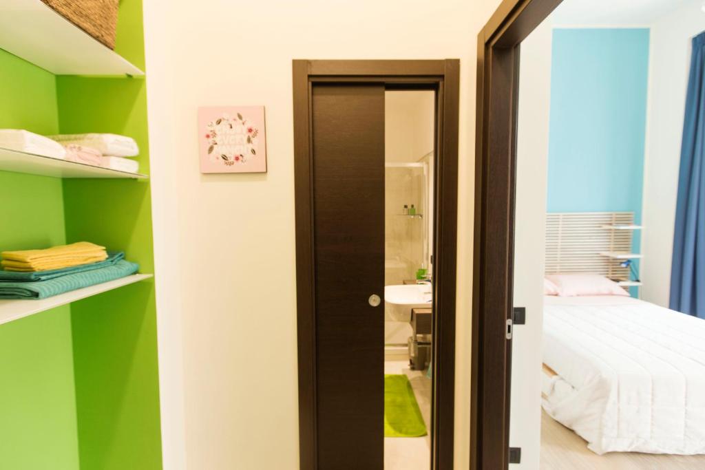 Posteľ alebo postele v izbe v ubytovaní N A P Experience Apartments