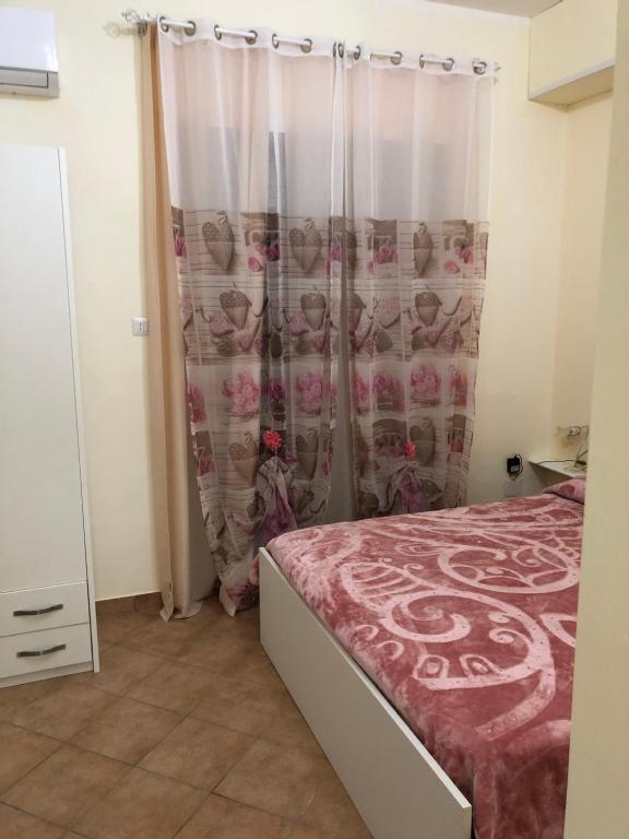Łóżko lub łóżka w pokoju w obiekcie B&B la reggia