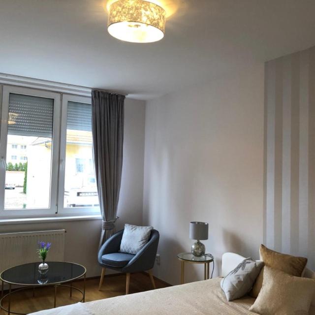 Posteľ alebo postele v izbe v ubytovaní Centrum 2 Apartmanok