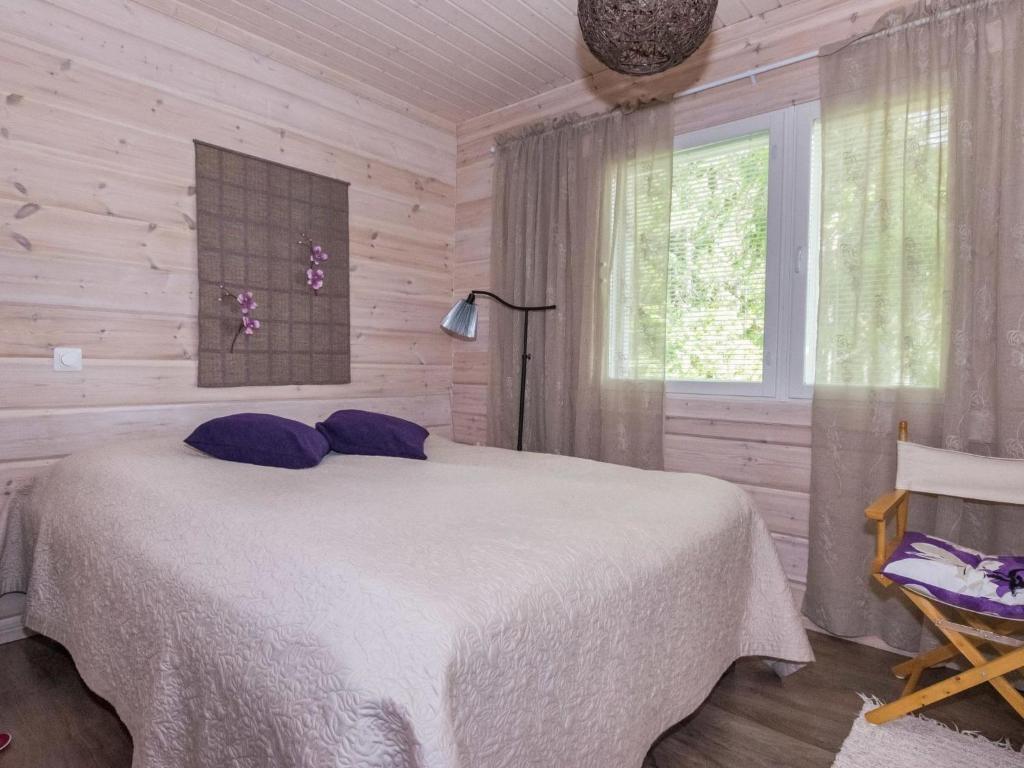 Postel nebo postele na pokoji v ubytování Holiday Home Villa ina by Interhome
