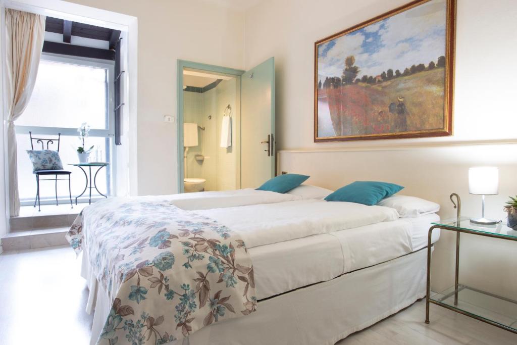 Een bed of bedden in een kamer bij Antiche Mura