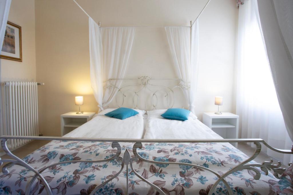 Een bed of bedden in een kamer bij Antiche Mura
