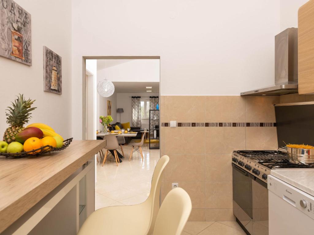 Kuchyň nebo kuchyňský kout v ubytování Holiday Home Casetta Filip by Interhome