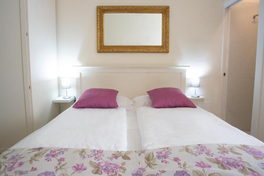 Een bed of bedden in een kamer bij Antiche Mura