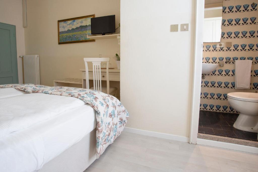 Een bed of bedden in een kamer bij Antiche Mura