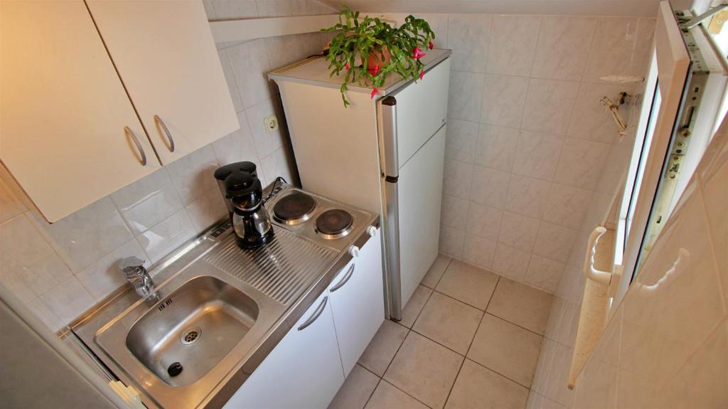 Kuchyňa alebo kuchynka v ubytovaní Apartments Slado