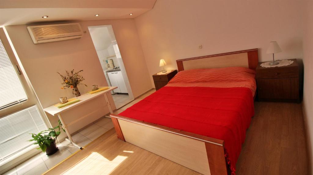 Posteľ alebo postele v izbe v ubytovaní Apartments Slado