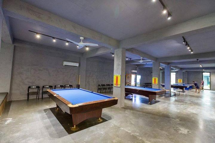 a large room with two ping pong tables in it at Sheng Tu Villa in Hengchun South Gate