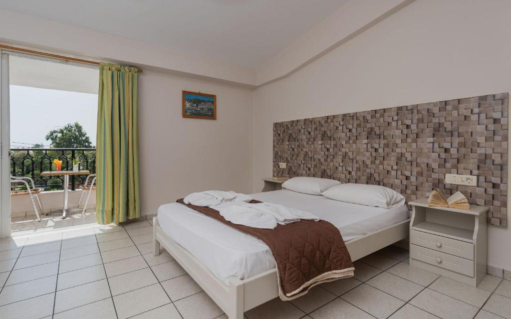 Postel nebo postele na pokoji v ubytování Hotel Cronulla