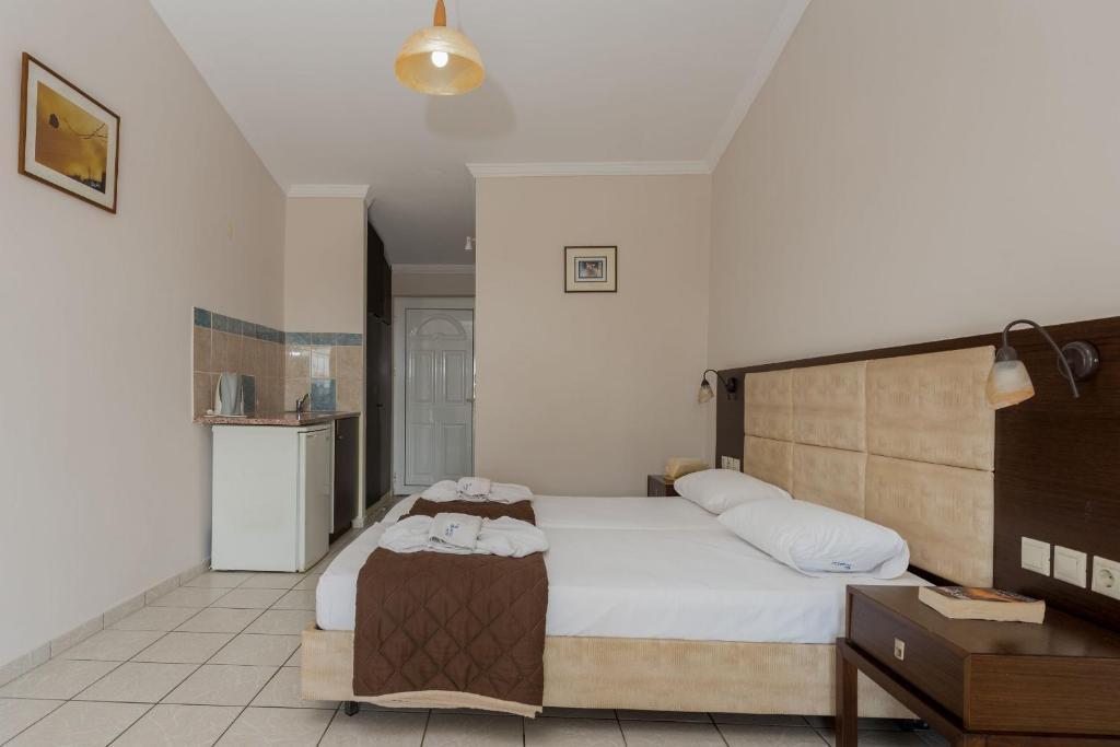 Postel nebo postele na pokoji v ubytování Hotel Cronulla