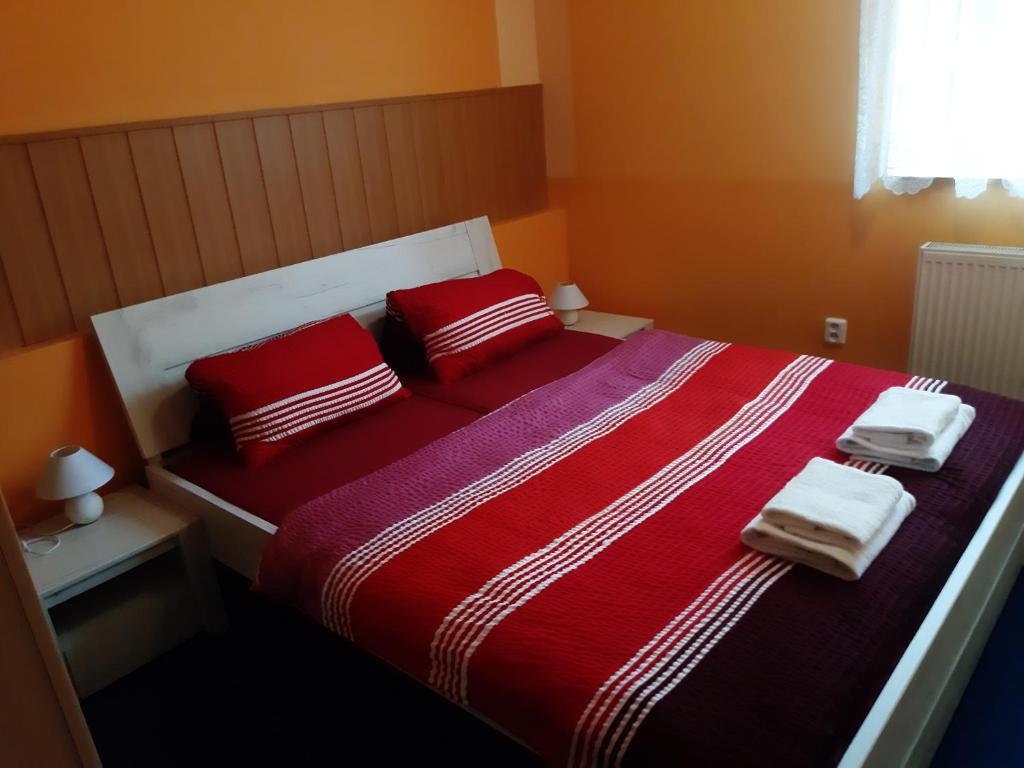 Postel nebo postele na pokoji v ubytování Pension Kobr