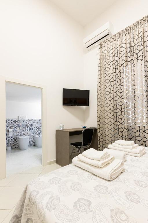 Postel nebo postele na pokoji v ubytování B&B Il Sognatore