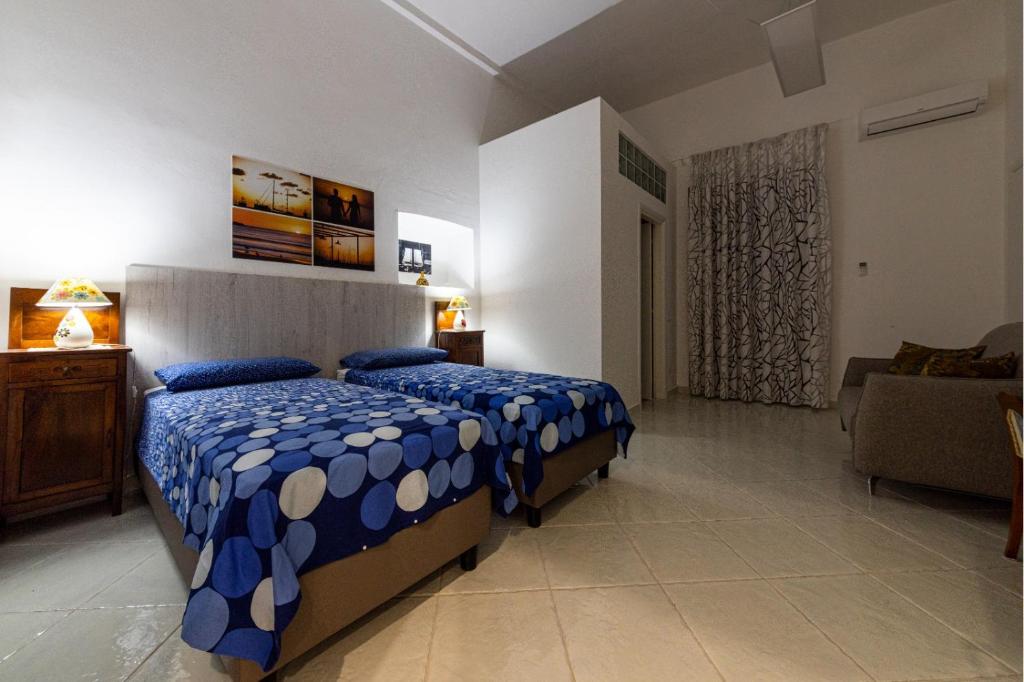 Postel nebo postele na pokoji v ubytování B&B Il Sognatore