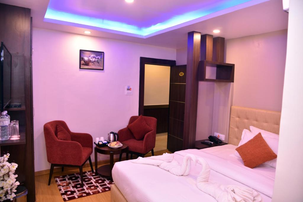Postel nebo postele na pokoji v ubytování Marinha Airport Hotel