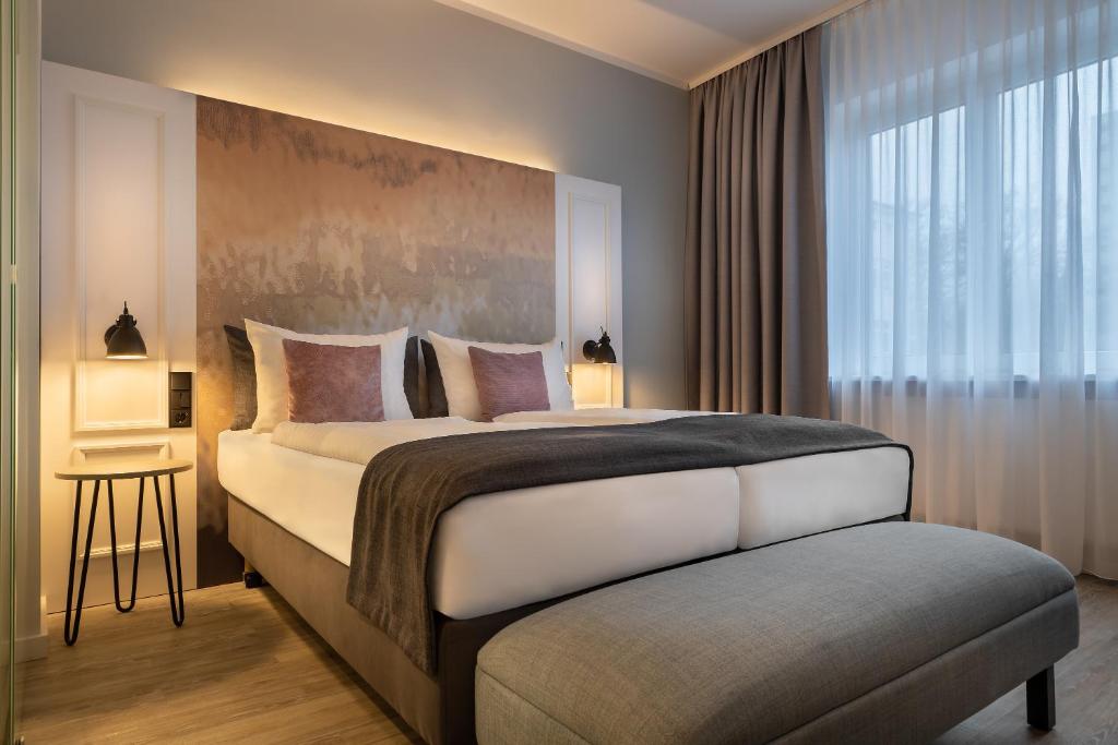 Postel nebo postele na pokoji v ubytování Garner Hotel Berlin - Wilmersdorf by IHG