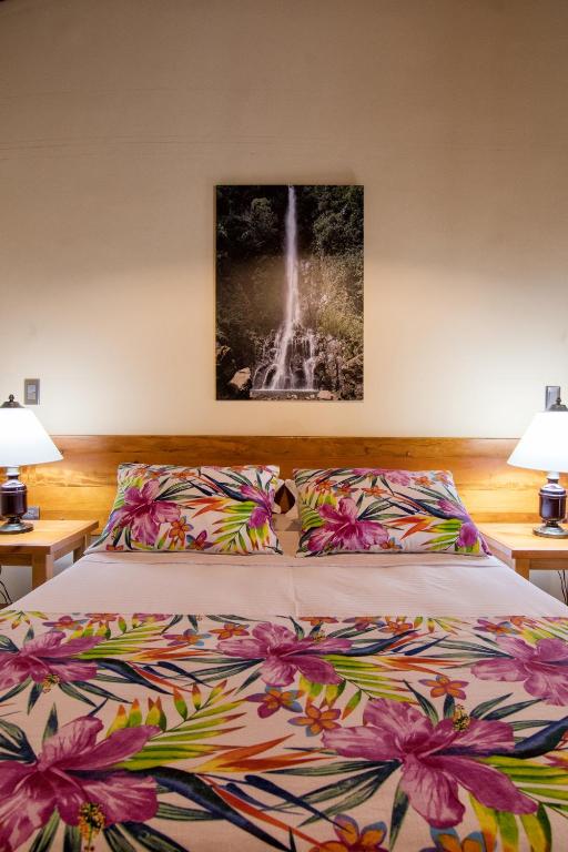 Postel nebo postele na pokoji v ubytování Hotel Valdivia Plaza