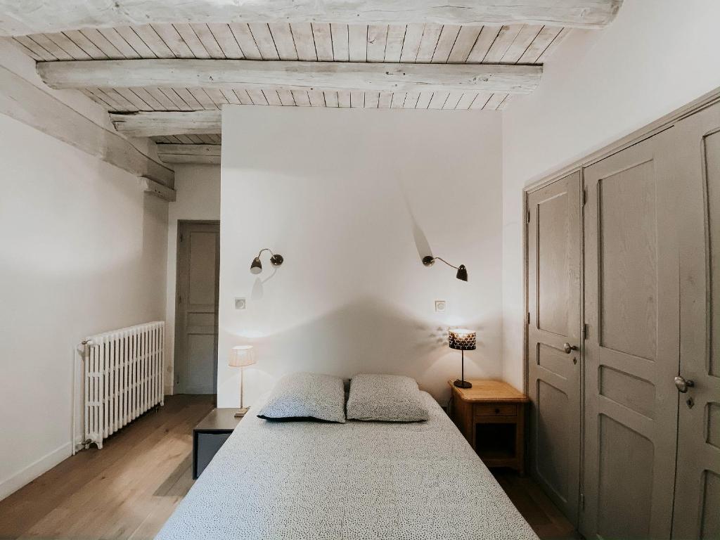 Postel nebo postele na pokoji v ubytování Le Val Suzenay