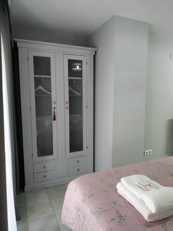 Posteľ alebo postele v izbe v ubytovaní Kentia Rooms
