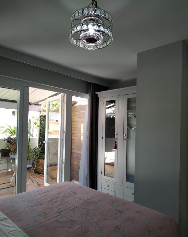 Posteľ alebo postele v izbe v ubytovaní Kentia Rooms
