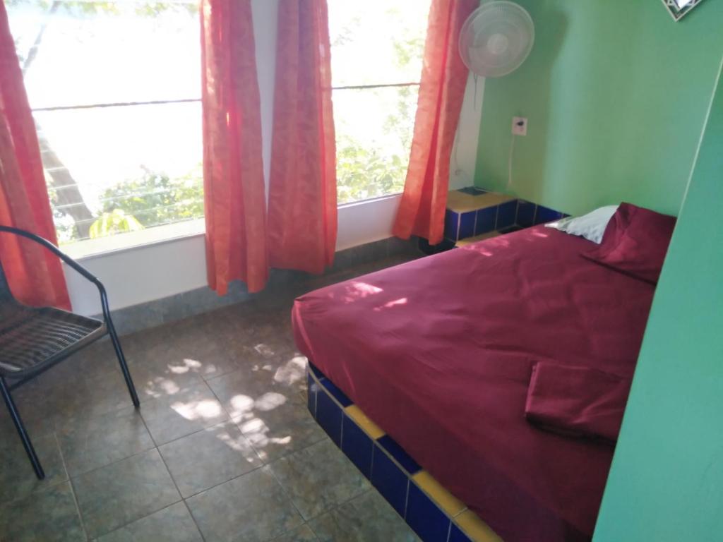 Postel nebo postele na pokoji v ubytování Boca Brava Lodge